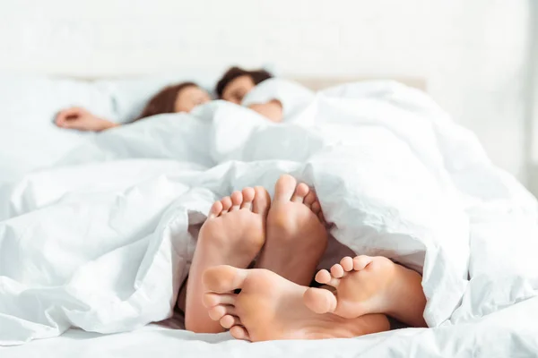 Selective Focus Barefoot Young Woman Man Lying Blanket Bed — Stock Photo, Image