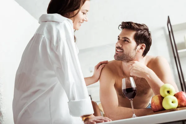 Low Angle View Happy Girl Looking Handsome Shirtless Man Wine — Stock Photo, Image