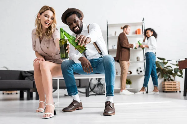 Selective Focus Happy Girl Laughing Clinking Bottles Beer Cheerful African — Stock Photo, Image