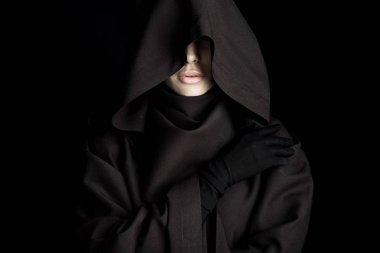 front view of beautiful woman in death costume isolated on black clipart