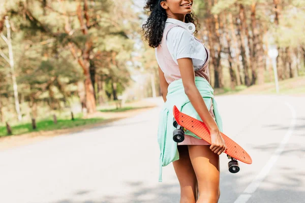 Cropped View African American Girl Standing Road Holding Penny Board — Stock Photo, Image