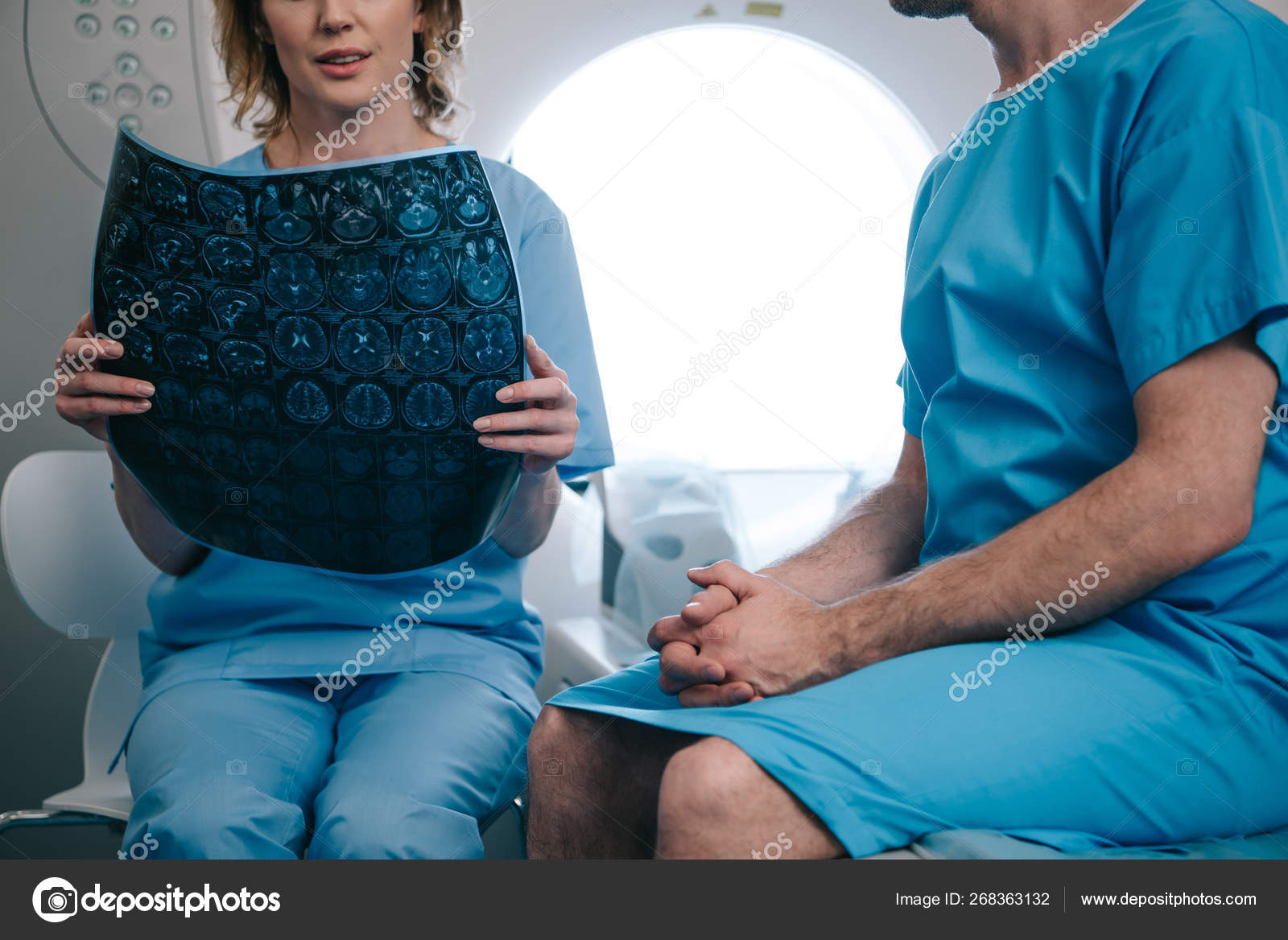 Cropped View Radiologist Holding Ray Diagnosis While Sitting Patient