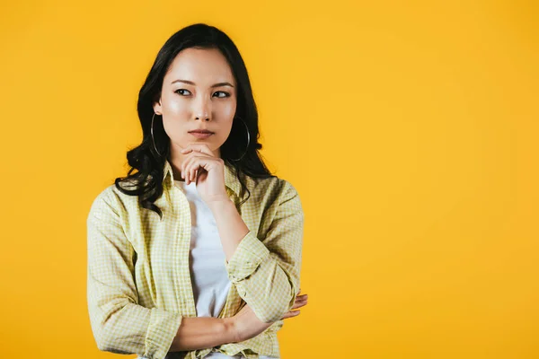 Pensive Brunette Asian Girl Isolated Yellow — Stock Photo, Image