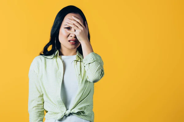 Scared Brunette Asian Girl Closing Face Isolated Yellow — Stock Photo, Image