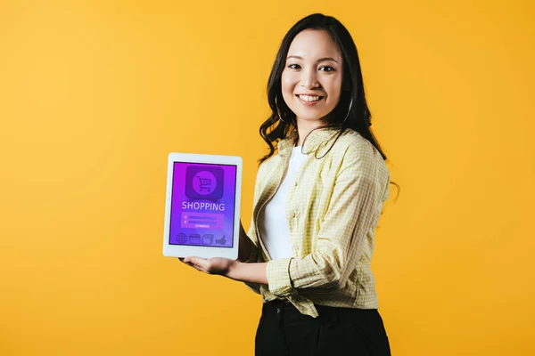 Happy Asian Girl Showing Digital Tablet Shopping App Isolated Yellow — Stock Photo, Image