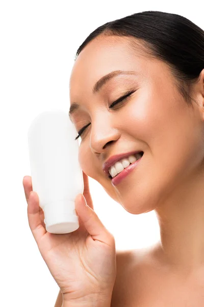 Attractive Smiling Asian Woman Closed Eyes Holding Bottle Lotion Isolated — Stock Photo, Image