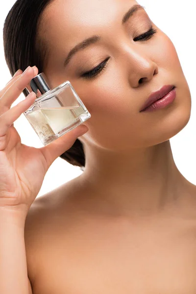 Tender Asian Woman Closed Eyes Holding Perfume Isolated White — Stock Photo, Image