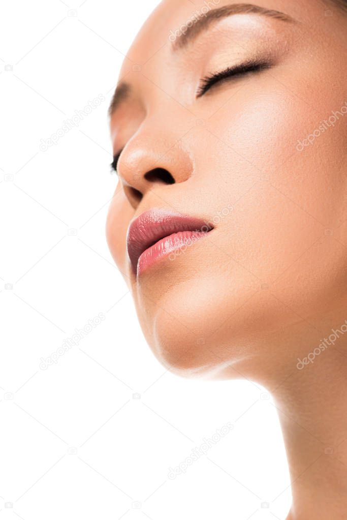 attractive asian woman with closed eyes, isolated on white