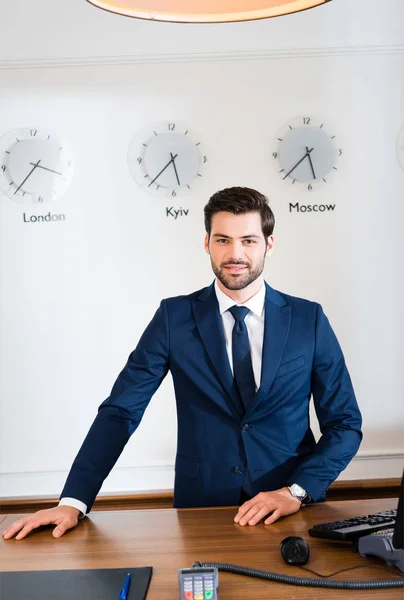 Cheerful Bearded Receptionist Standing Reception Desk Hotel — Stock Photo, Image