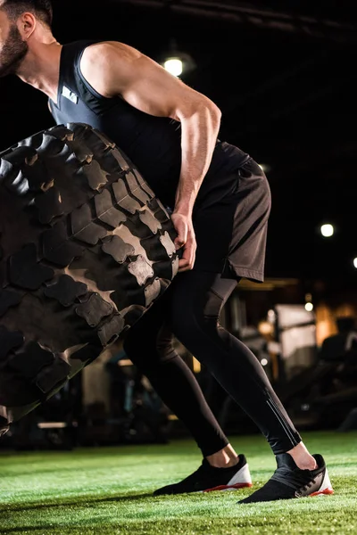 Cropped View Athletic Man Working Out Car Tire Green Grass — Stock Photo, Image