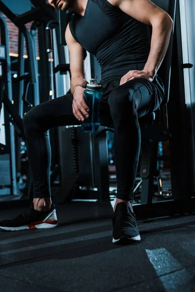 Cropped View Man Sitting Holding Sport Bottle Gym — Stock Photo, Image