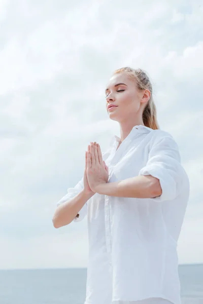 Low Angle View Young Woman Praying Hands Sea — Stock Photo, Image