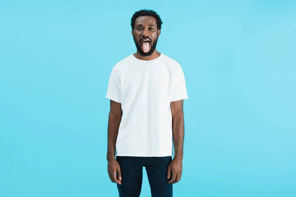 Handsome African American Man Sticking Tongue Out Isolated Blue — Stock Photo, Image