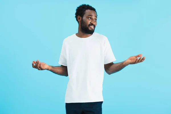 Happy African American Man Showing Shrug Gesture Isolated Blue — Stock Photo, Image