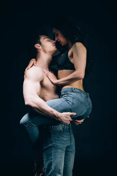 Sexy Man Jeans Muscular Torso Holding Girlfriend Hands Isolated Black — Stock Photo, Image