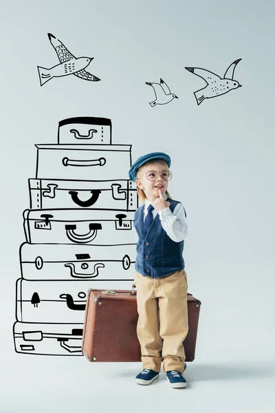 Dreamy Kid Retro Vest Cap Holding Suitcase Looking Away Grey — Stock Photo, Image