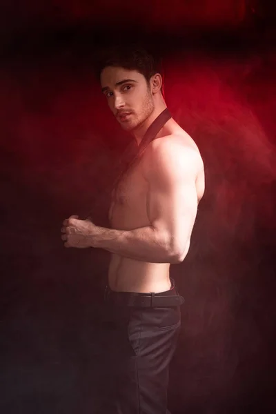 Shirtless Sexy Muscular Man Looking Camera Red Smoke — Stock Photo, Image