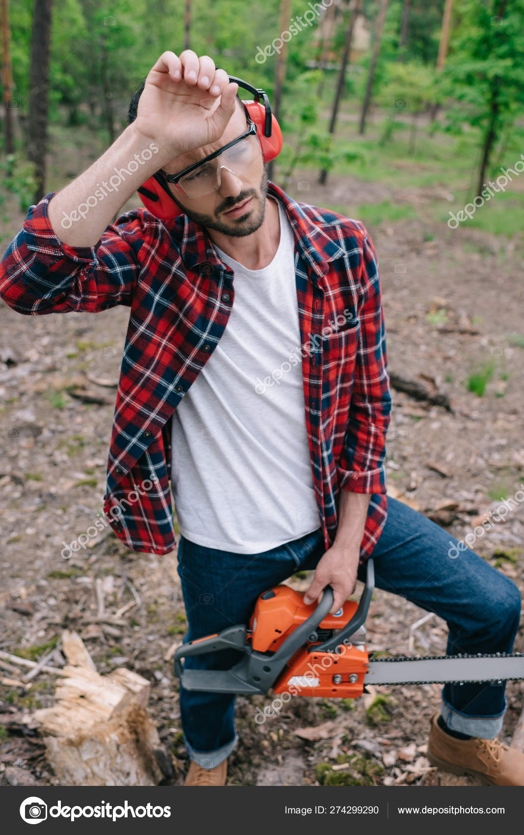Exhausted Lumberjack Chainsaw Holding Hand Head Looking Away Forest