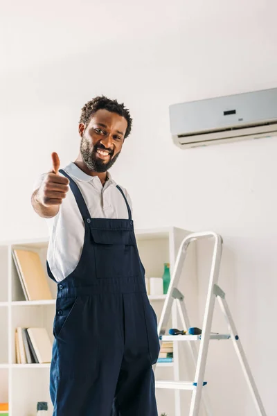 Happy African American Repairman Standing Ladder Air Conditioner Looking Camera — Stock Photo, Image
