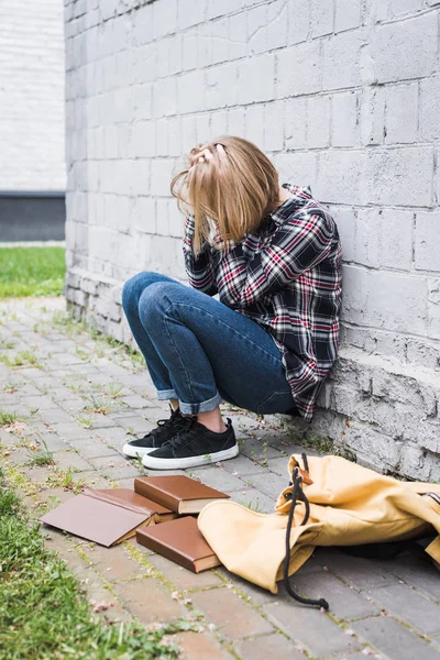 Upset Blonde Teen Shirt Jeans Sitting Wall — Stock Photo, Image