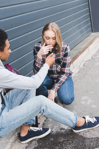 African American Boy Lighting Cigarette Blonde Pretty Teen — Stock Photo, Image