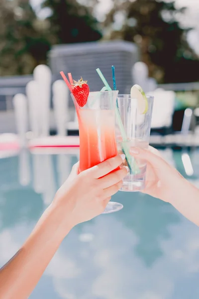 Cropped View Women Clinking Glasses Cocktail Swimming Pool — Stock Photo, Image