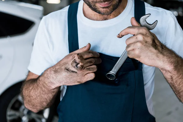 Bearded Auto Mechanic Mud Hands Holding Hand Wrench Car Repair — Stock Photo, Image