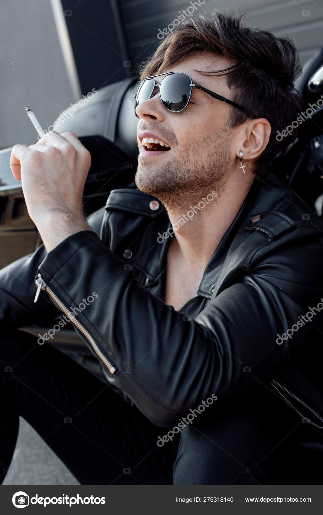 Handsome Motorcyclist Sunglasses Leather Jacket Smoking