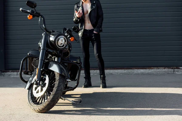 Cropped View Motorcyclist Smoking Standing Black Motorcycle — Stock Photo, Image