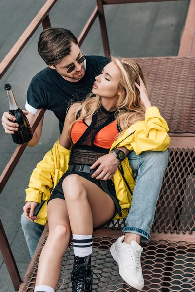 Handsome Man Glasses Holding Bottle Hugging Attractive Woman — Stock Photo, Image