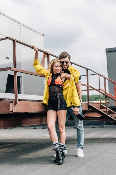 Blonde Woman Handsome Man Glasses Hugging Smiling Roof — Fotografie, imagine de stoc