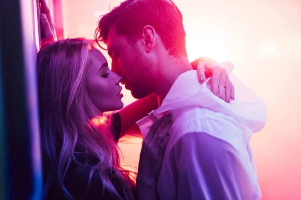 Side View Attractive Blonde Woman Hugging Kissing Handsome Man — Stock Photo, Image