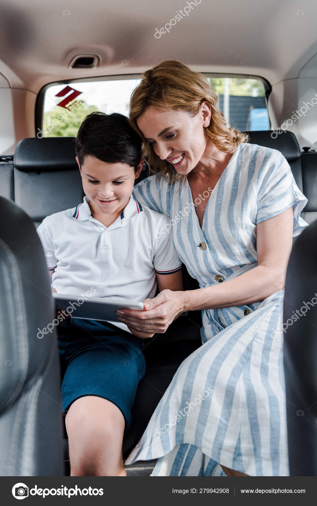Selective Focus Happy Mother Son Using Digital Tablet Car — Stock Photo ©  VitalikRadko 279942908