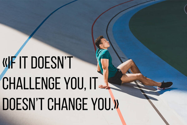 side view of mixed race sportsman sitting on running track at stadium in sunny weather with if it doesnt challenge you, it doesnt change you illustration