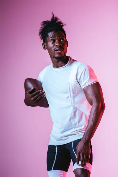 Handsome African American Sportsman Looking Away While Holding Rugby Ball — Stock Photo, Image