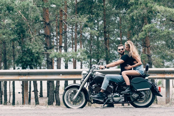 Side View Young Couple Bikers Black Motorcycle Road Green Forest — Stock Photo, Image