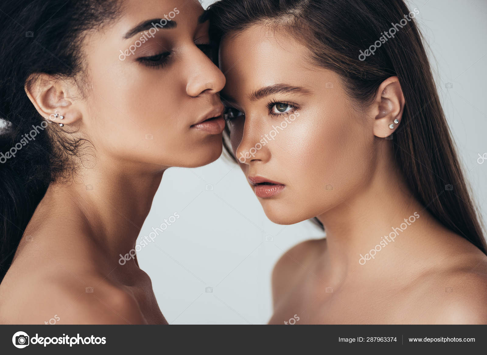 Two Attractive Nude Multiethnic Young Women Looking Away Isolated Grey Stock Photo by ©VitalikRadko 287963374