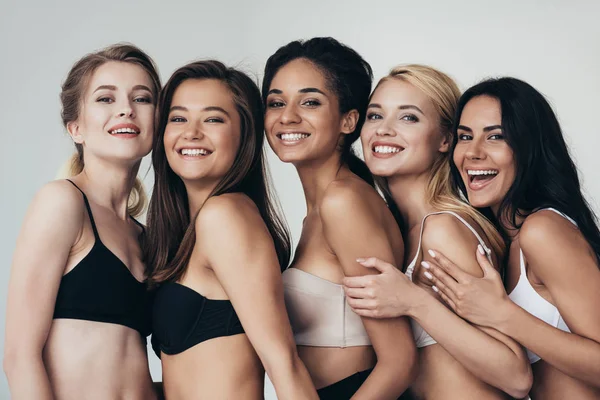 Five Sexy Multiethnic Young Women Underwear Embracing Smiling Isolated Grey — Stock Photo, Image