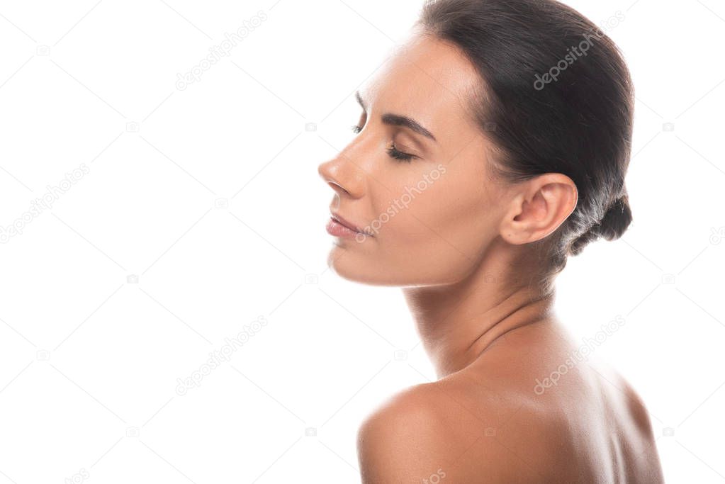 naked young woman with closed eyes isolated on white