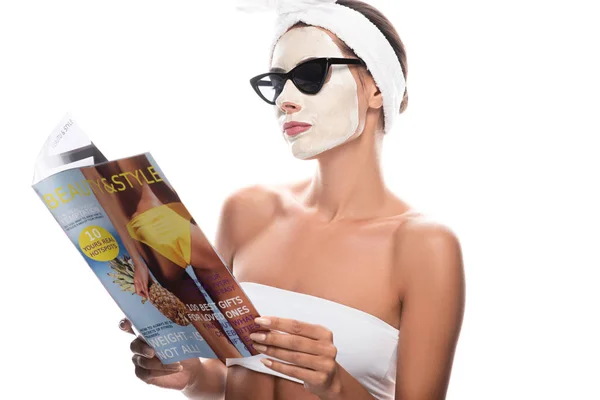 Woman Cosmetic Hair Band Sunglasses Facial Mask Reading Magazine Isolated — Stock Photo, Image