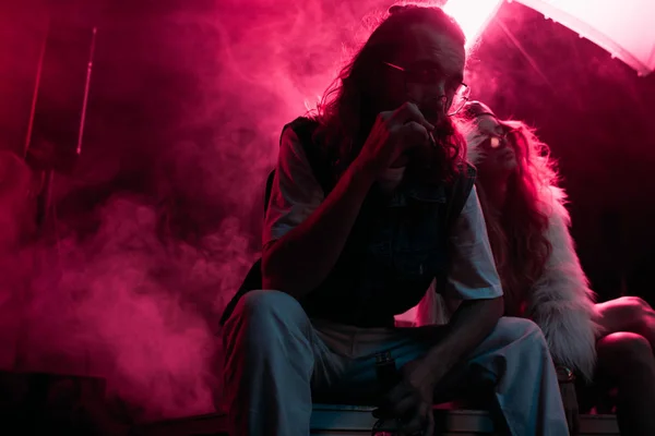 Man Smoking Cigarette Young Woman Rave Party Nightclub — Stock Photo, Image