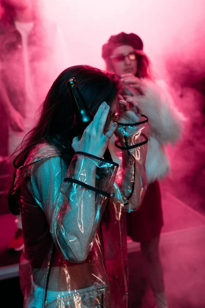 Girl Covering Face While Dancing Nightclub Pink Smoke — Stock Photo, Image