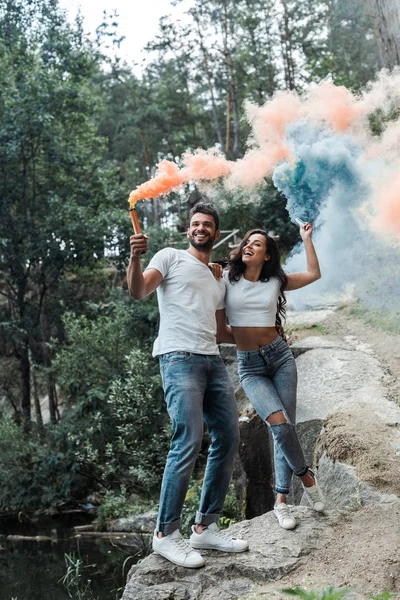 Happy Woman Cheerful Bearded Man Holding Smoke Bombs — Stock Photo, Image