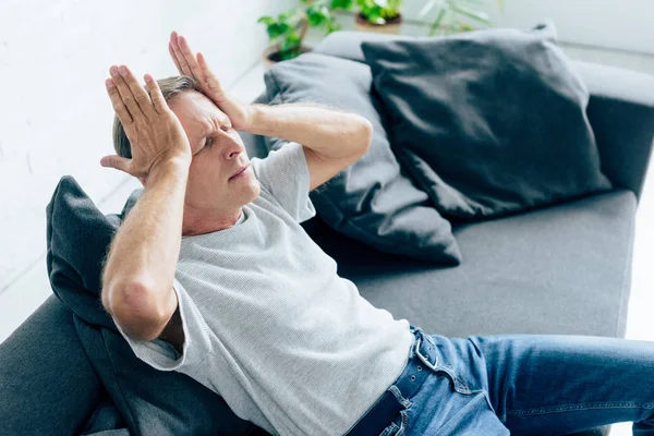 Handsome Man Shirt Closed Eyes Touching Head Apartment — Stock Photo, Image