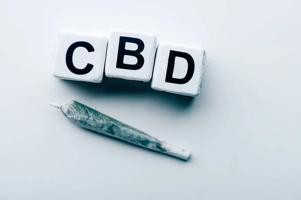 Top View Cubes Lettering Cbd Blunt White Background — Stock Photo, Image