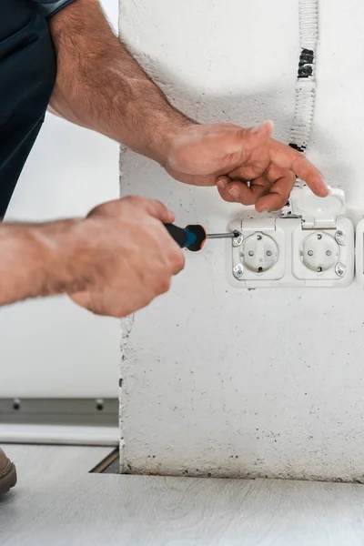 Cropped View Technician Holding Screwdriver Power Socket — Stock Photo, Image