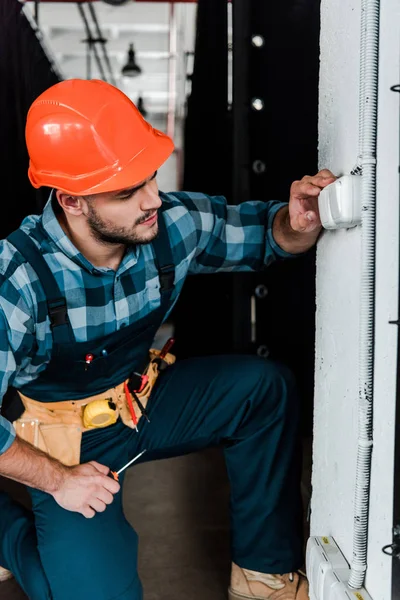 Handsome Bearded Worker Safety Helmet Touching Light Switch — Stock Photo, Image