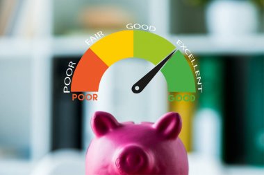pink piggy bank on wooden desk near colorful speed meter with letters in office  clipart