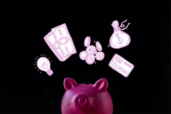 pink piggy bank near light bulb, cash and money bag on black 
