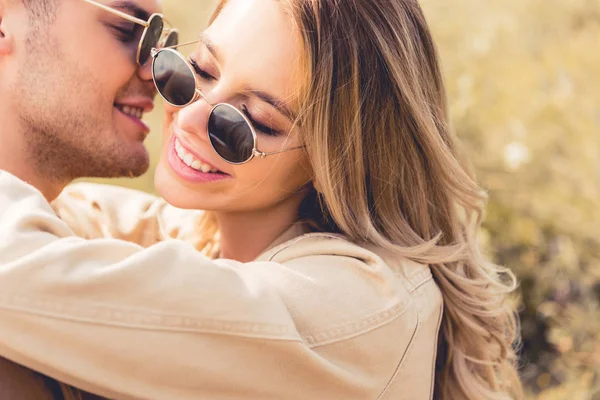 Attractive Woman Hugging Kissing Handsome Man Sunglasses Royalty Free Stock Images